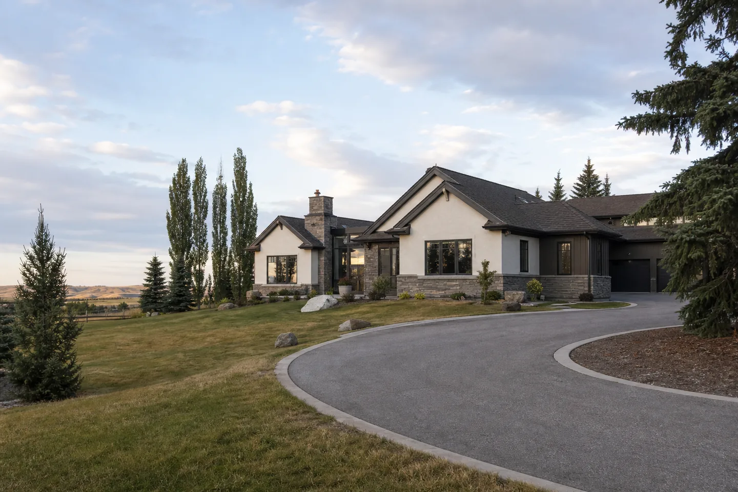 Springbank acreage residence with an original stucco home and a carefully integrated contemporary addition